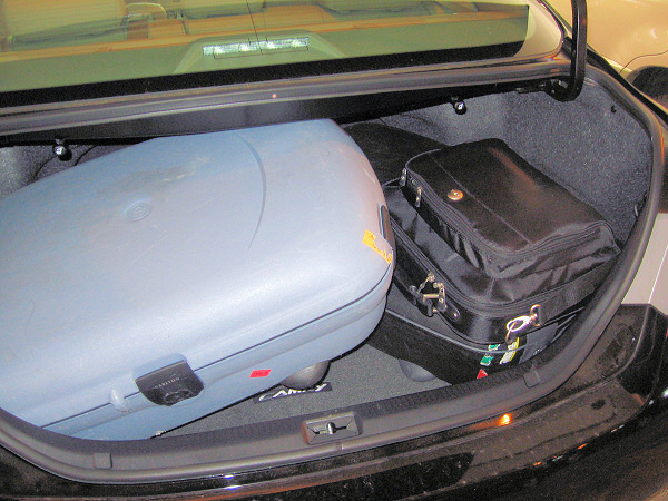 My suitcases just fit in the car.