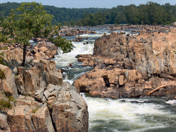 A cajak going down the Potomac river.