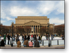 Ice skating ring with the National Archives in the background.