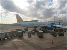 Luggage being loaded on an United aircraft.