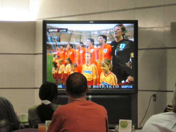 Watching soccer.