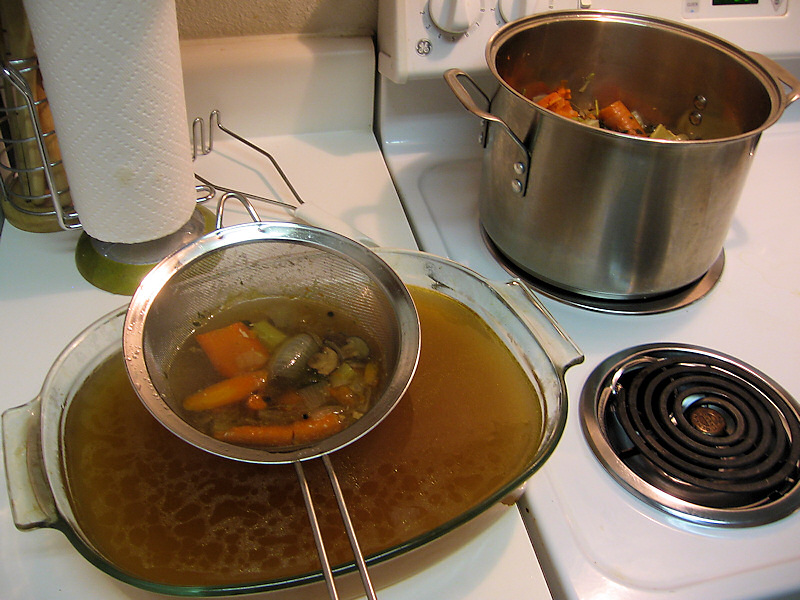 Filtering the bouillon.