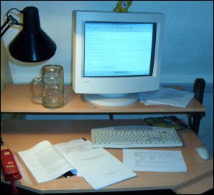 Papers on the desk.